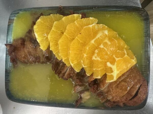 Pato con salsa naranja